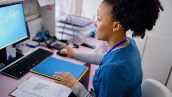 Research: nurse using computer 1394002689