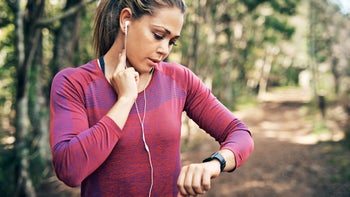 Movement: Fitness: woman check pulse exercise 1019967520