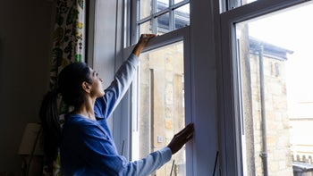 Allergies: woman closing window 1388212482
