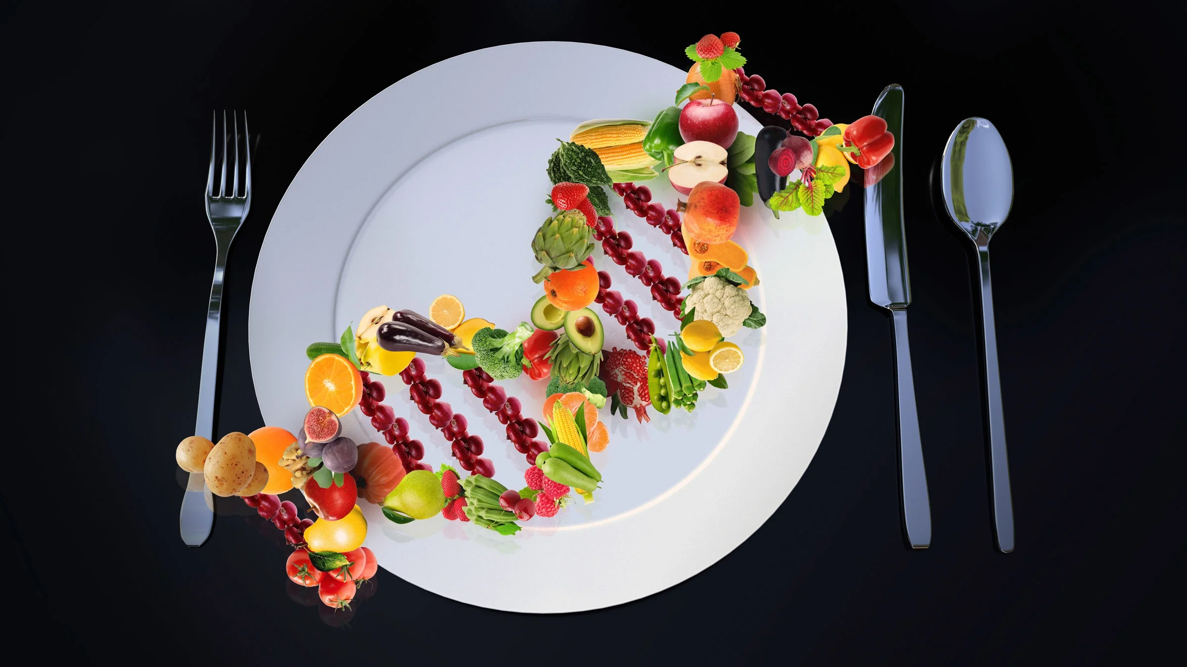 A place setting with a DNA helix made of fruits and vegetables on a plate.