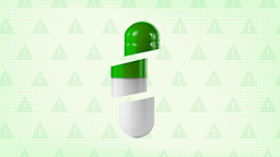 Light green background with overlayed warning sign pattern in darker green. In the center is a green and white capsule pill that is cut up into three sections.
GoodRx Health