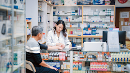 A pharmacist takes an older man's blood pressure at a drug store pharmacy.
Edwin Tan/E+ via Getty Images Plus