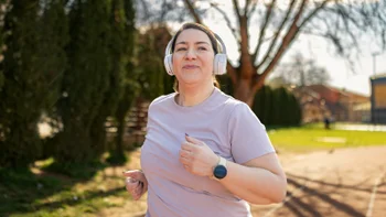Endocrinology: HCP: woman jogging with headphones 2265717255