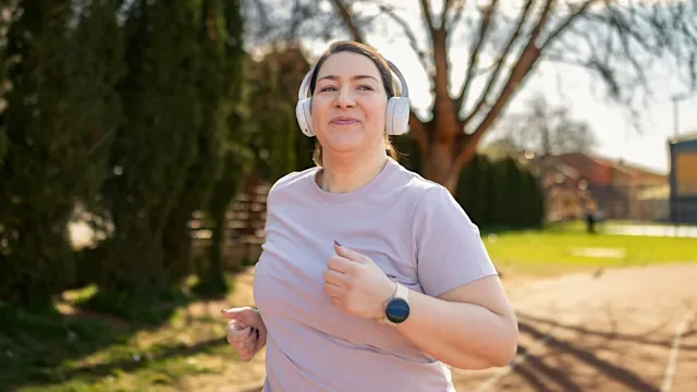 Endocrinology: HCP: woman jogging with headphones 2265717255