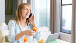A woman orders prescription refills using a cellphone.
AMR Image/iStock via Getty Images Plus
