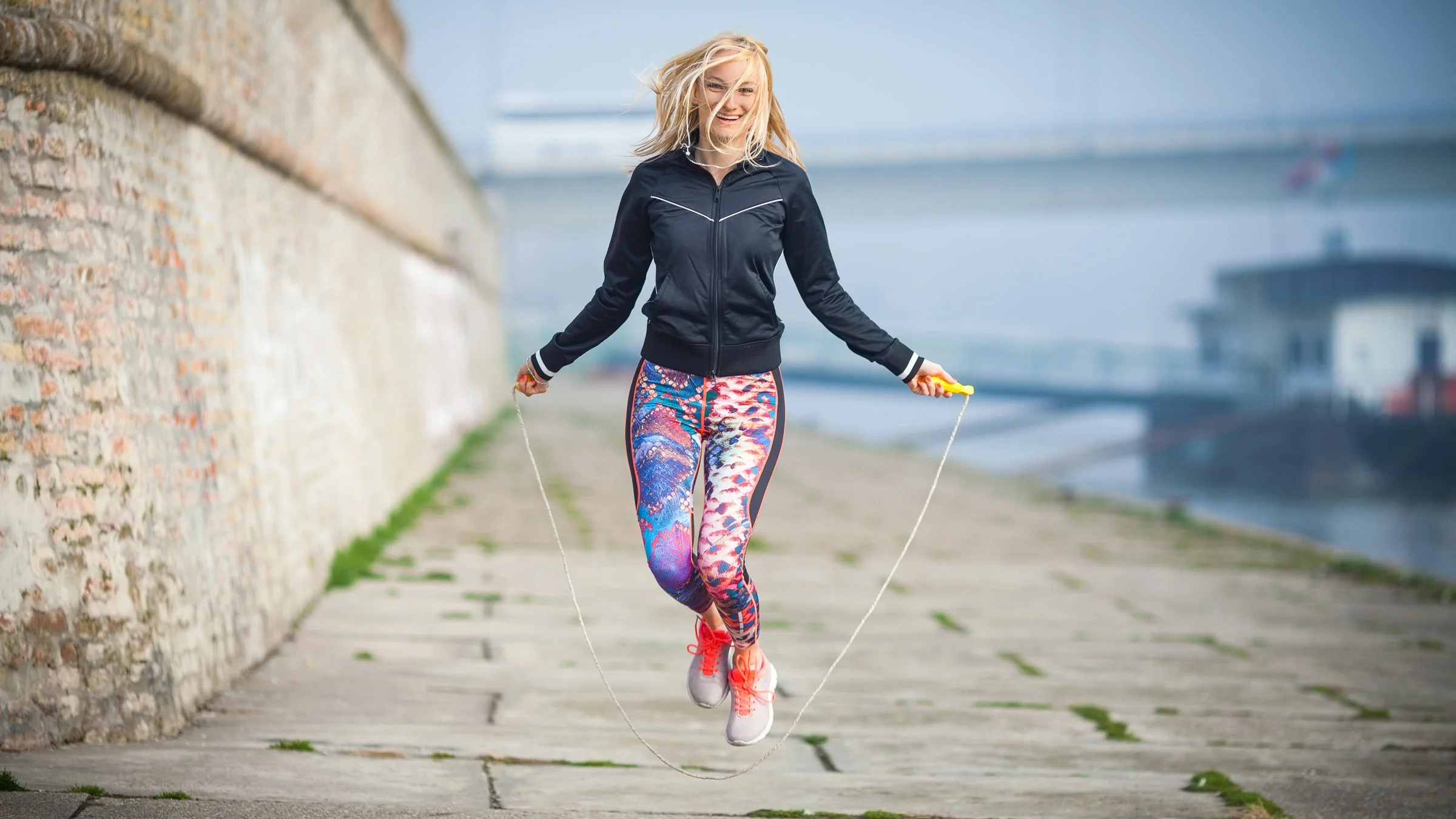 A person jumping rope.