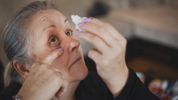 Health: Glaucoma: older woman eye drops-1203194483
