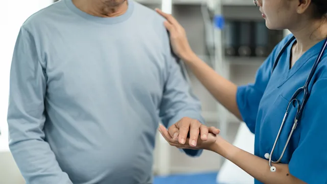 Heart failure: medical professional caring for patient 1690504579