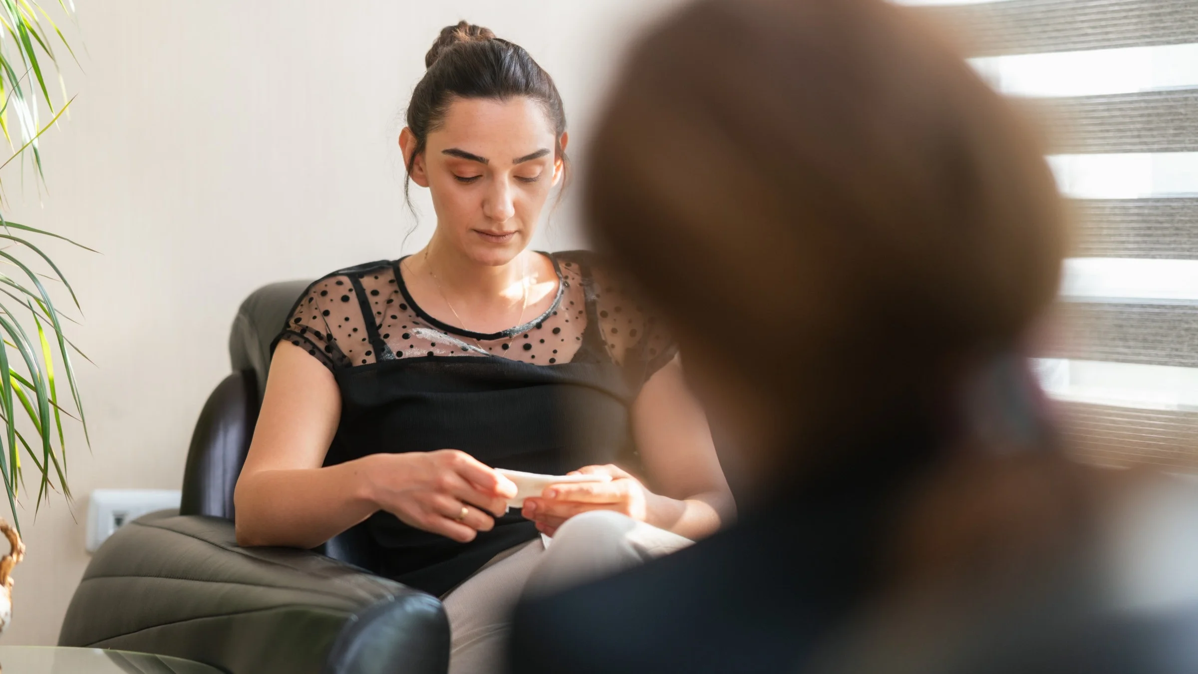 A client unpacking trauma with their therapist.