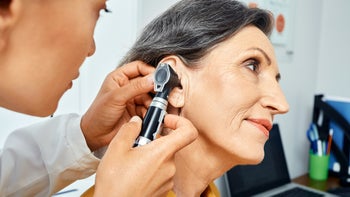 ear: woman hearing test 1327117074
