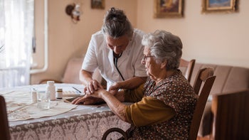 Parkinson's disease: Senior Health: examining senior patient 1702087688