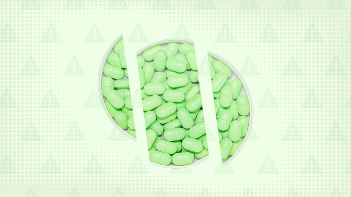 Light green halftone background with warning sign pattern. In the center is a prescription cap filled with light green pills cut into thirds.