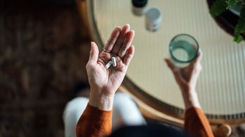 Health: Metformin: close up hand holding medicine 1349441051