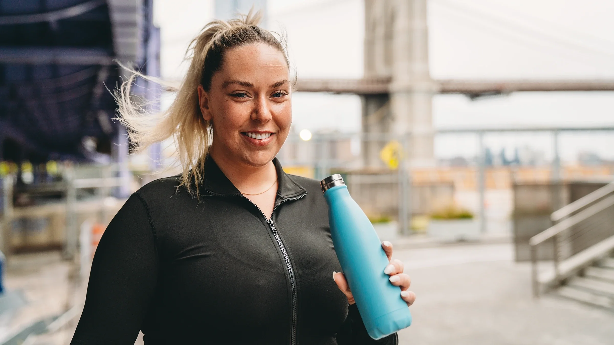 Woman drinking from a water bottle