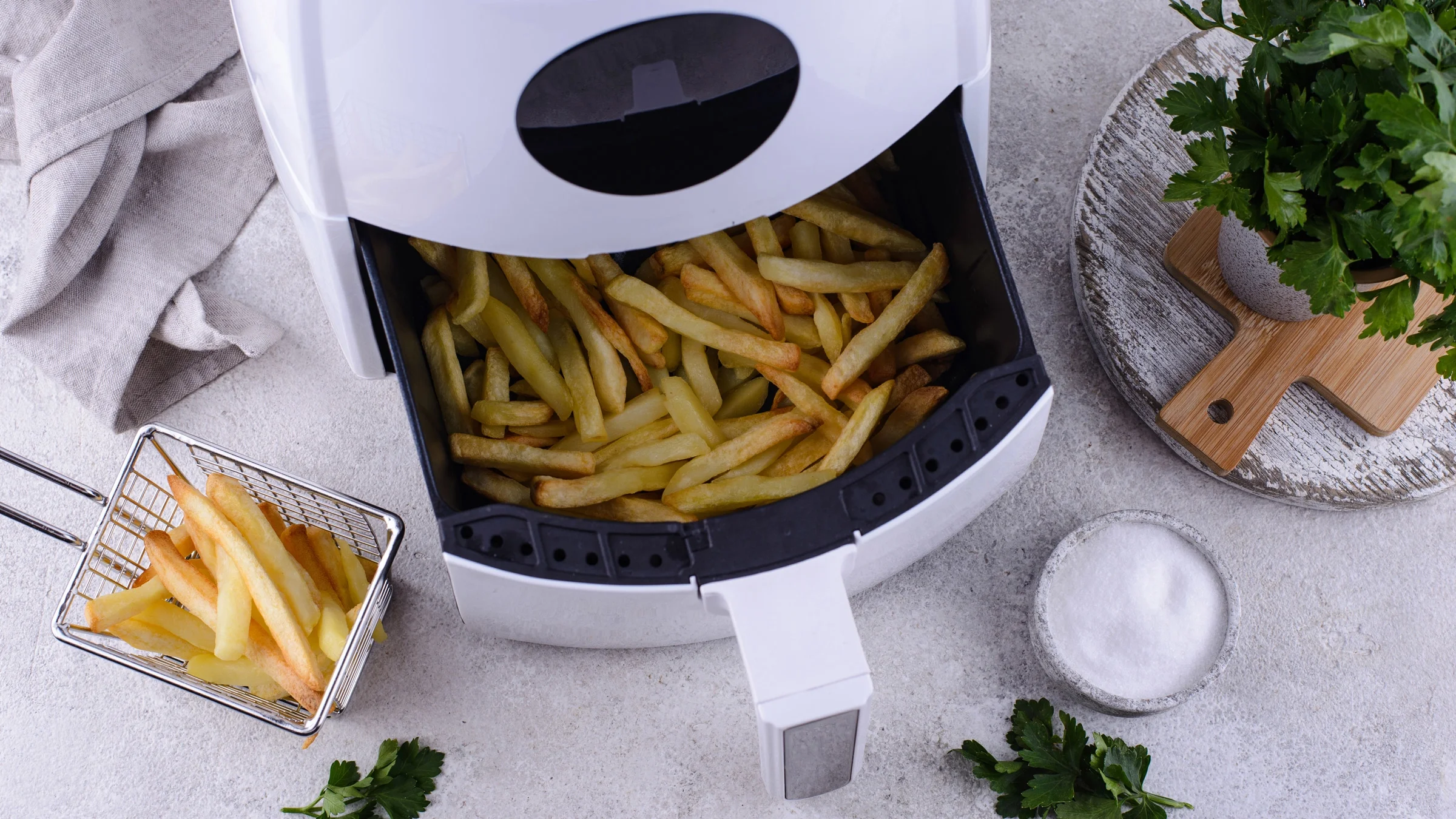 French fries in an air fryer.