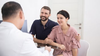 fertility: couple with doctor 1282976396
