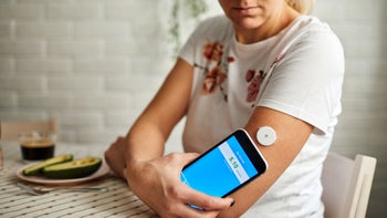 Health: Freestyle libre: close up glucose smartphone app 1288968370