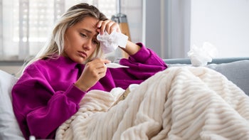 Alcohol: sick person on couch 1175000095