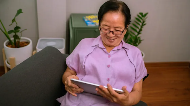 Medicare: Telehealth: 	older adult on tablet 1320653846