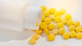 Health: Substance use: bottle of yellow pills spilling-1369026114