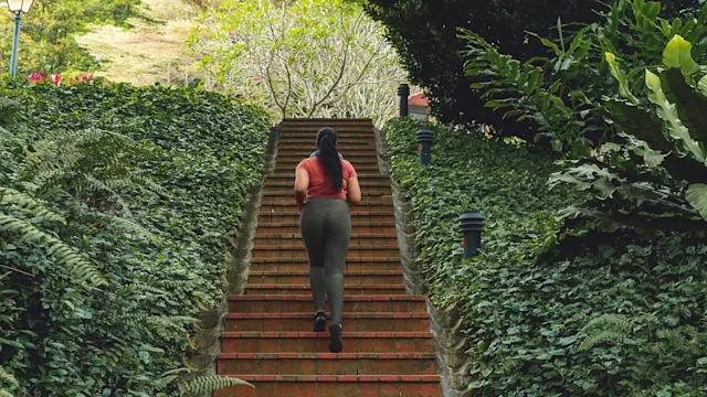 Movement Exercise: woman running up stairs 1390297497