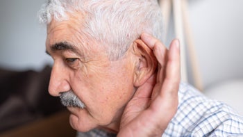 Side effects: Hearing loss: holding ear to hear better 1499161883