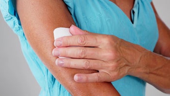 Medication education: sticking patch on arm 1507230046
