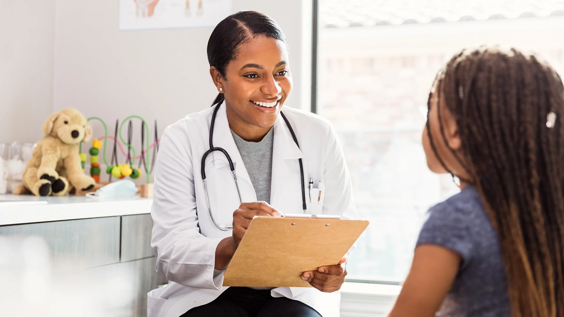 A pediatrician is evaluating a child patient.