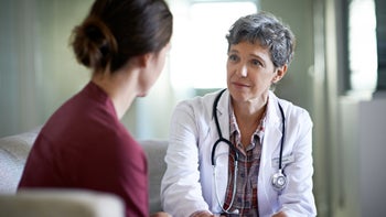 HCP: Expedited partner therapy: doctor talking to patient sitting down-481073822