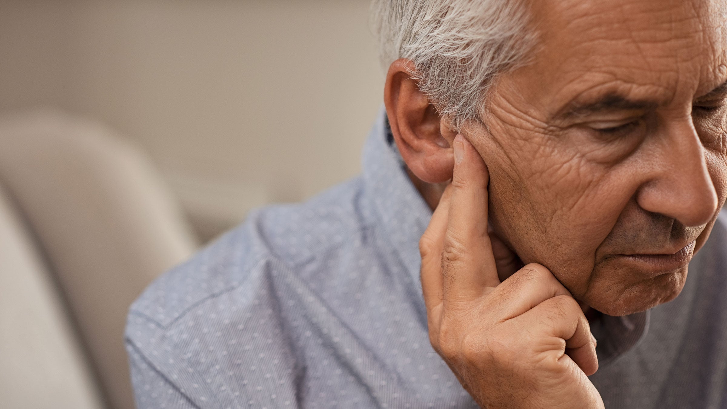 Ear: senior man ear pain 1029343276