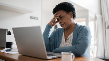 Health: Headaches: woman headache at home computer 1350655621