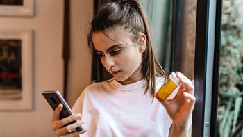 Substance-use: woman searching online about medicine 1286209331