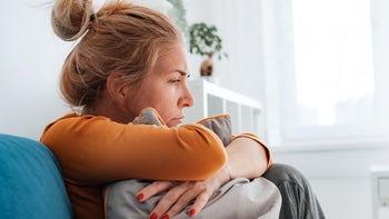 Health: Mental health: woman clutching a pillow 1413987763