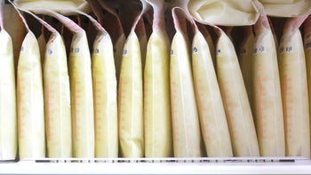 breast milk bags lined up-486333504