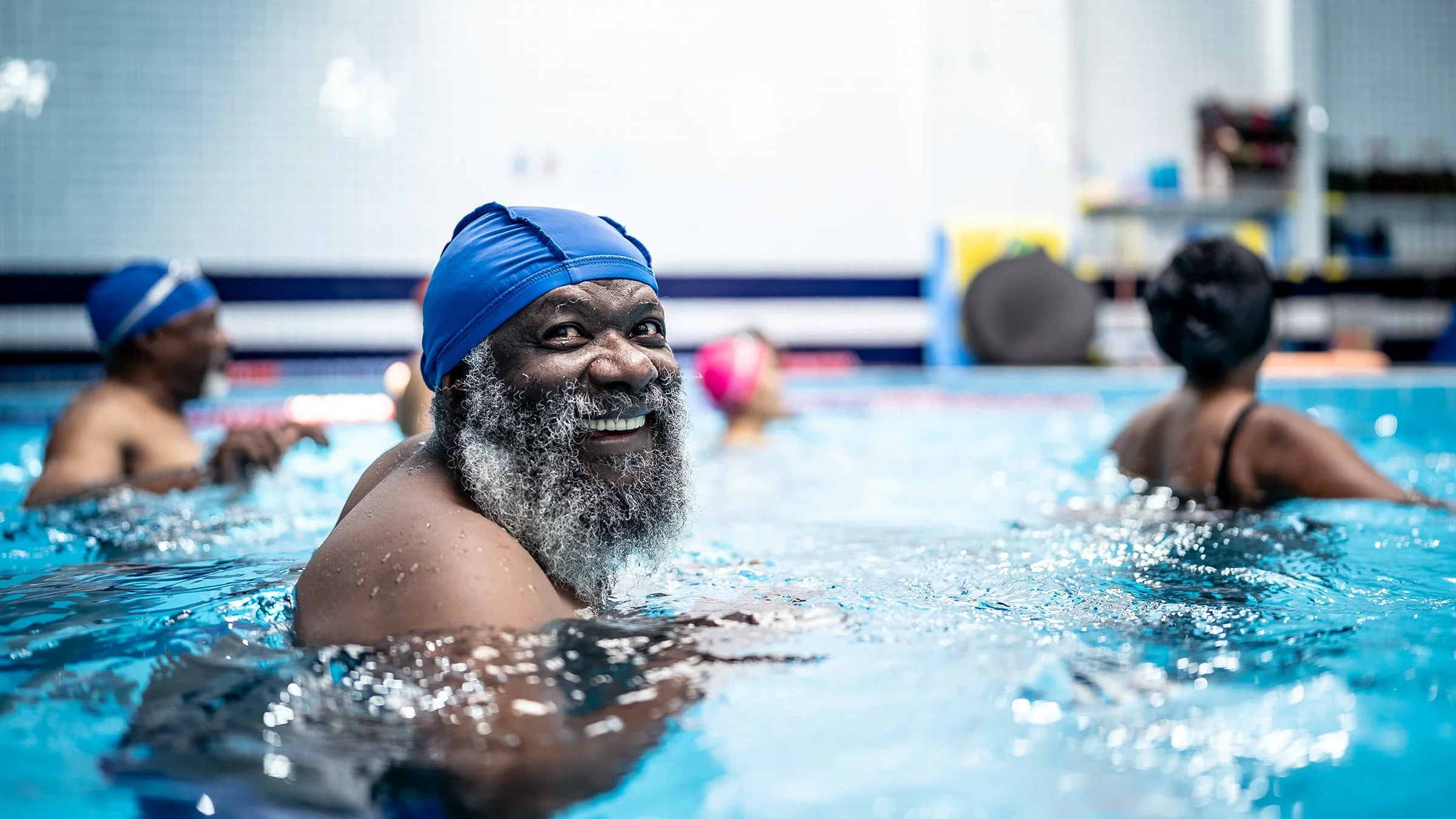 Medicare: portrait of man in swimming pool 1451002371