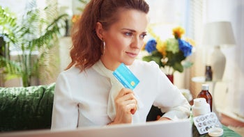 FSA HSA: holding credit card laptop pills 1223671571
