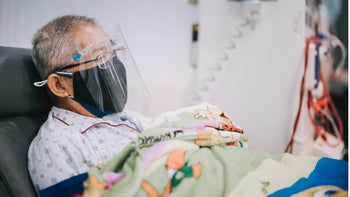 Health: Remdesivir : patient in hospital chair 1336700578