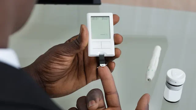 glucometer test on finger-518430316