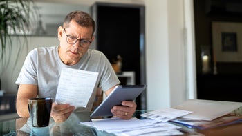 Medicare: man working from home 1143131282