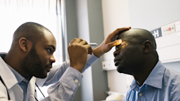 A doctor examines a patient's eye.
PixelCatchers/E+ via Getty Images 
