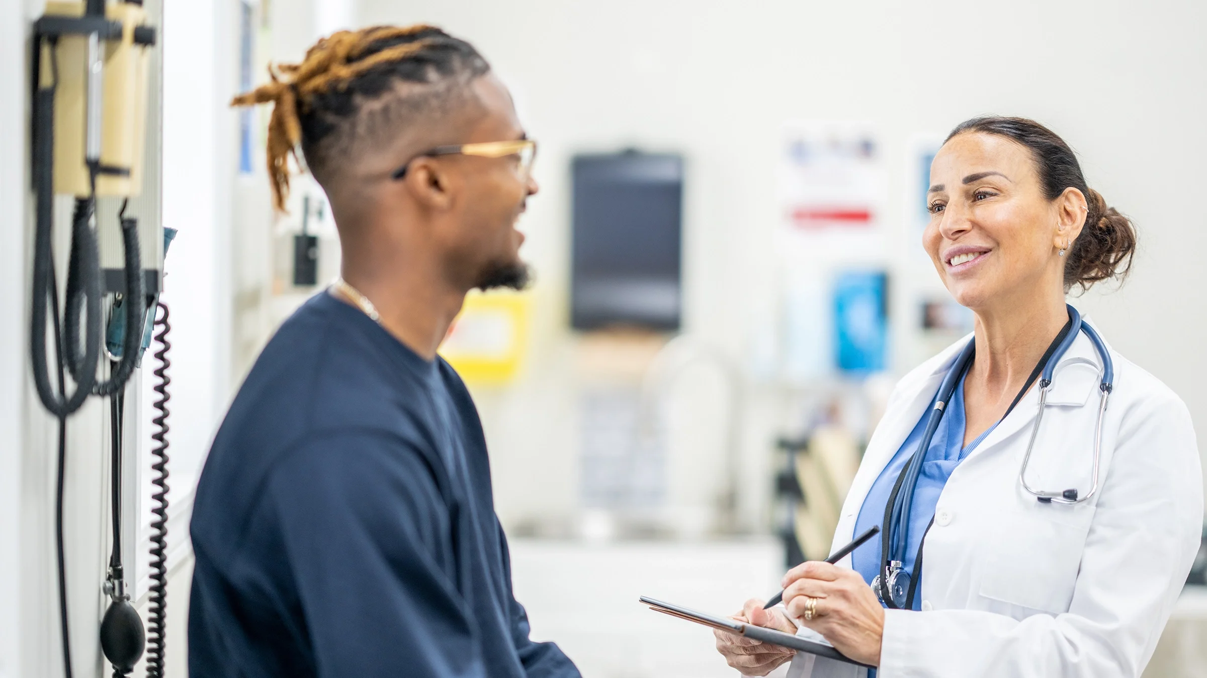 A patient consults with a healthcare professional.