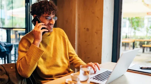 Research: man on phone and laptop 1351320979