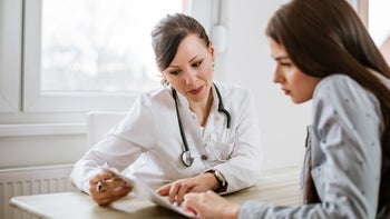 Eating disorder: Treatment: hcp explaining paperwork 908034252