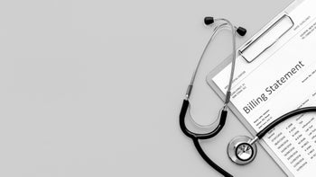 black and white image billing statment and stethoscope-1324705626 (1)