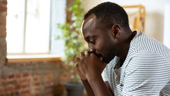 Mental-health: man reflecting in solitude 1345147292
