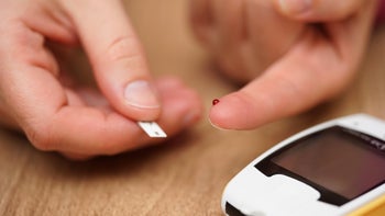 Health: Diabetes: glucometere blood drop test strip-524149258
