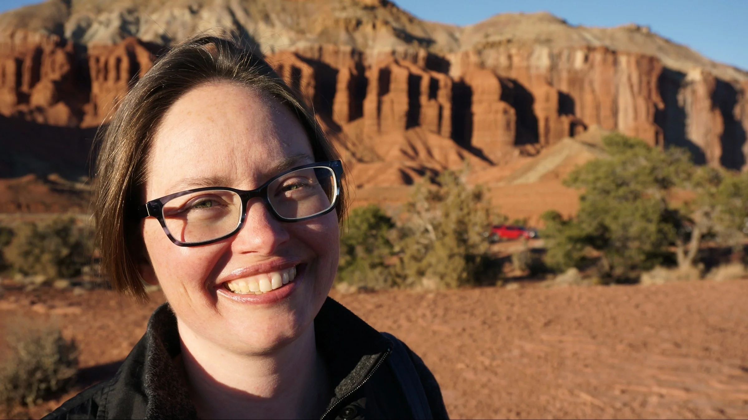 Cushing smiling at a desert.