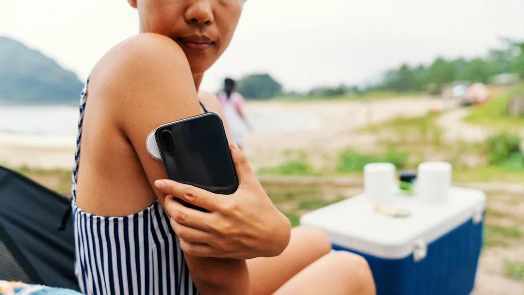 Health: Diabetes: closeup woman checking blood sugar 1268676454