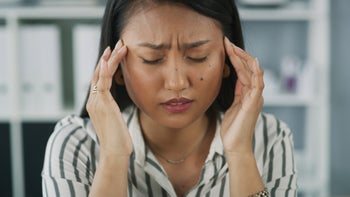 headaches: rubbing temples headache 2043430714