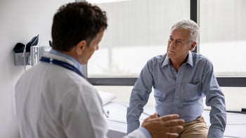 Health: Urology: senior man doctor consult-1352251583